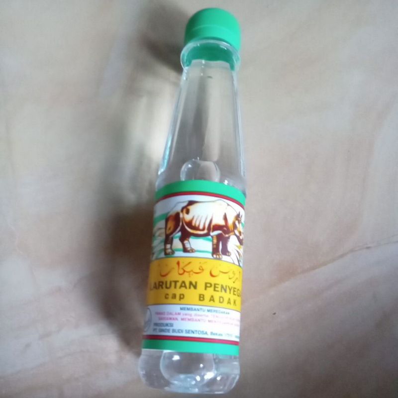 

Larutan Penyegar Cap Badak Botol 200 ml Eceran