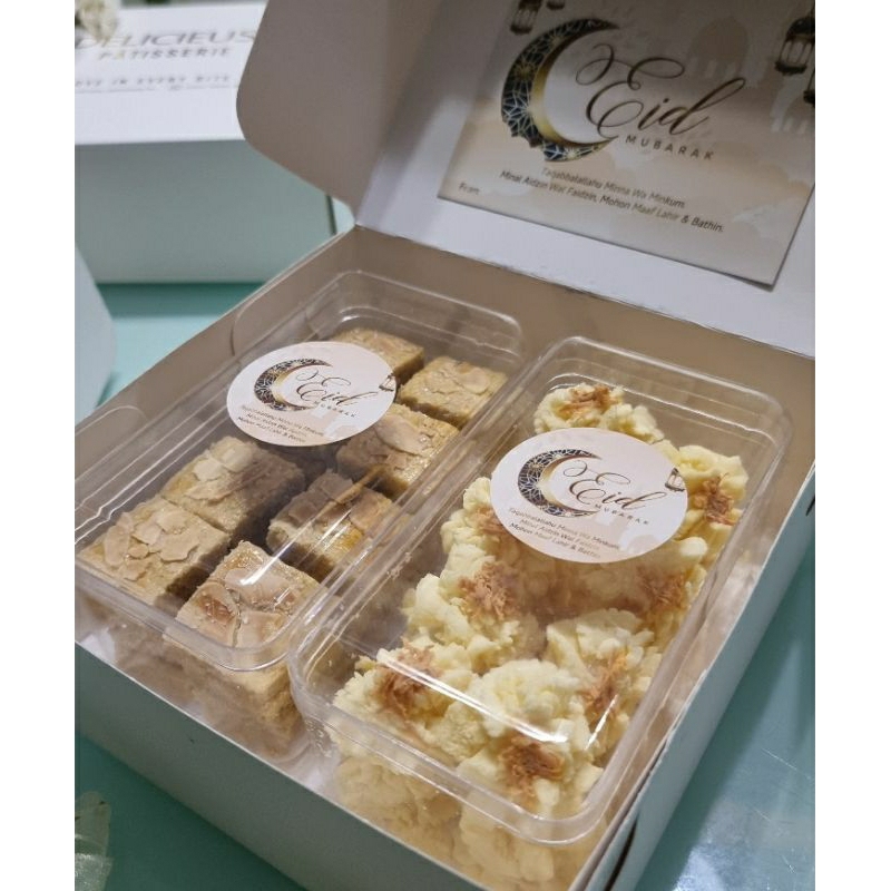 

Hampers Lebaran Premium Cookies 2 Toples dalam 1 Box (1 Almond Cookies +1 Sumprit Cookies)