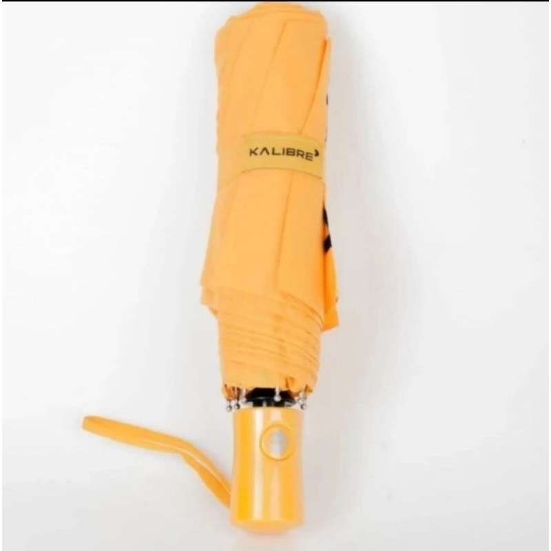 Payung kuning Kalibre