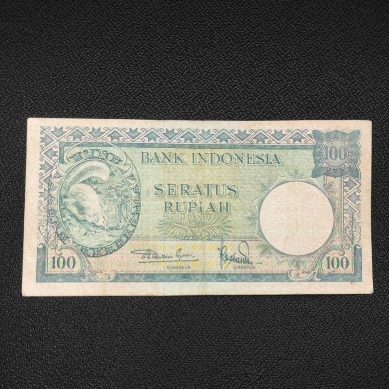 UANG INDONESIA SERI TUPAI PC 100 TAHUN 1957