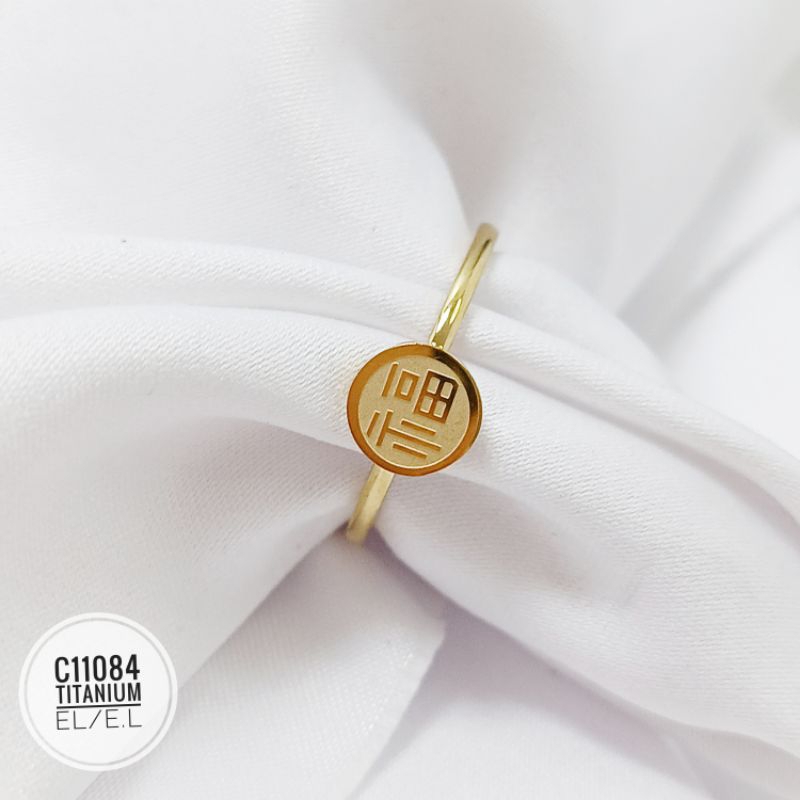Cincin titanium lucky word gold C11084