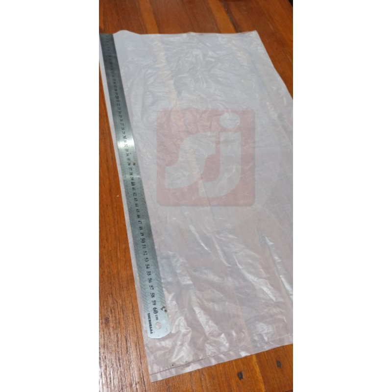 Plastik polos buram tebal (38,5cm x 68cm) Per100Lembar