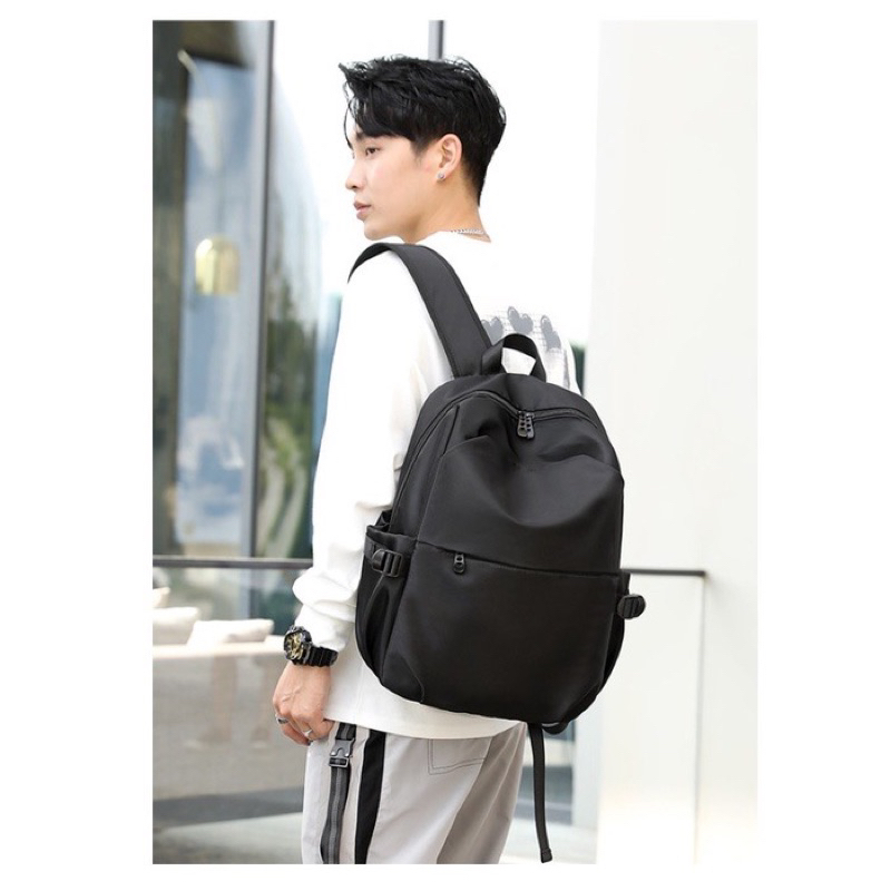 Tas Ransel Laptop sampai 15.6 inch Premium Anti Air Dengan Slot Usb untuk cas Hp Model Korea