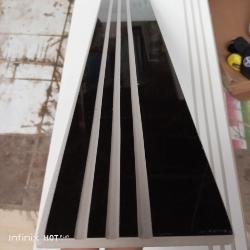 plint granit stepnosing hitam glossy 10x60