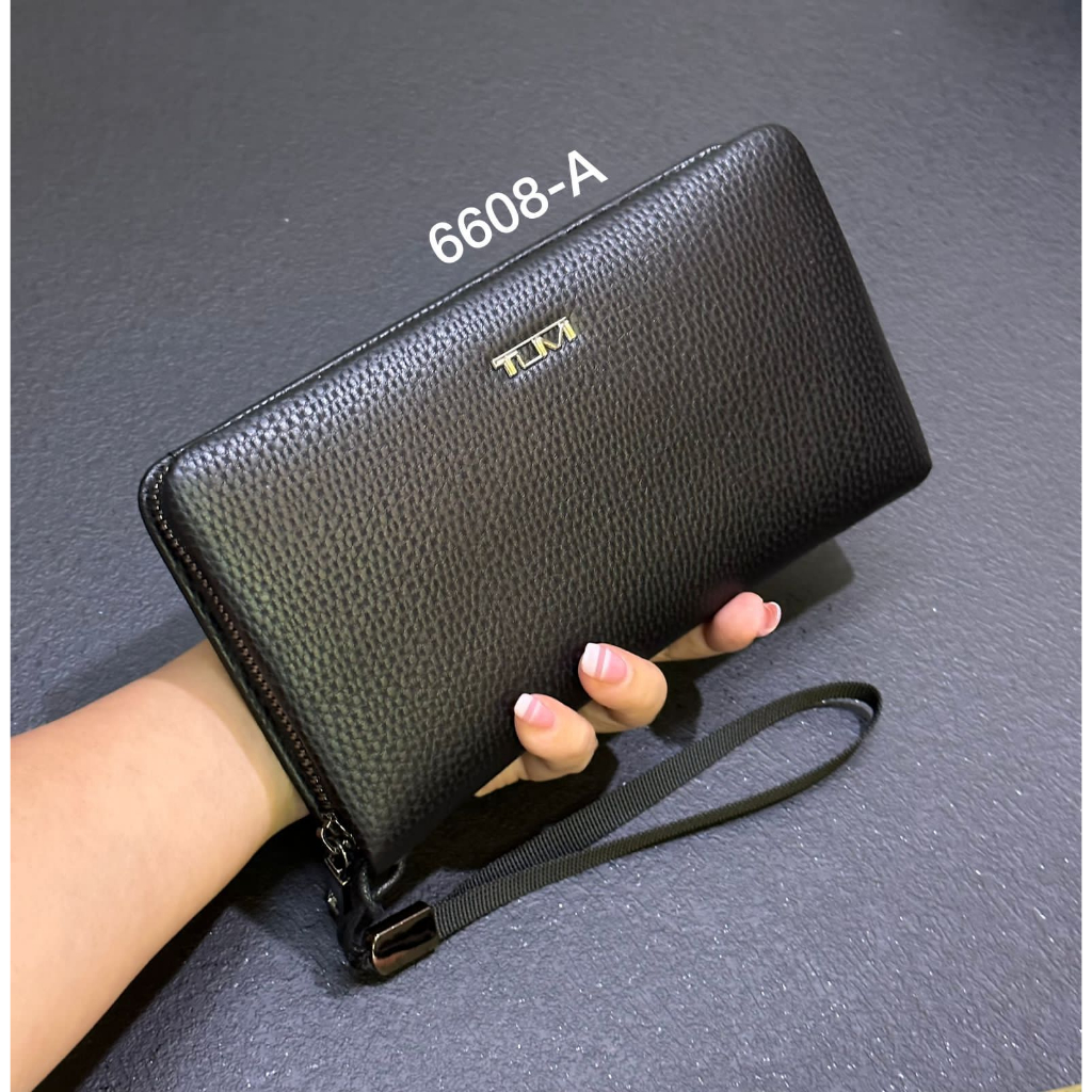 Dompet 1Sleting Bahan Kulit Jeruk Kode 660 Import