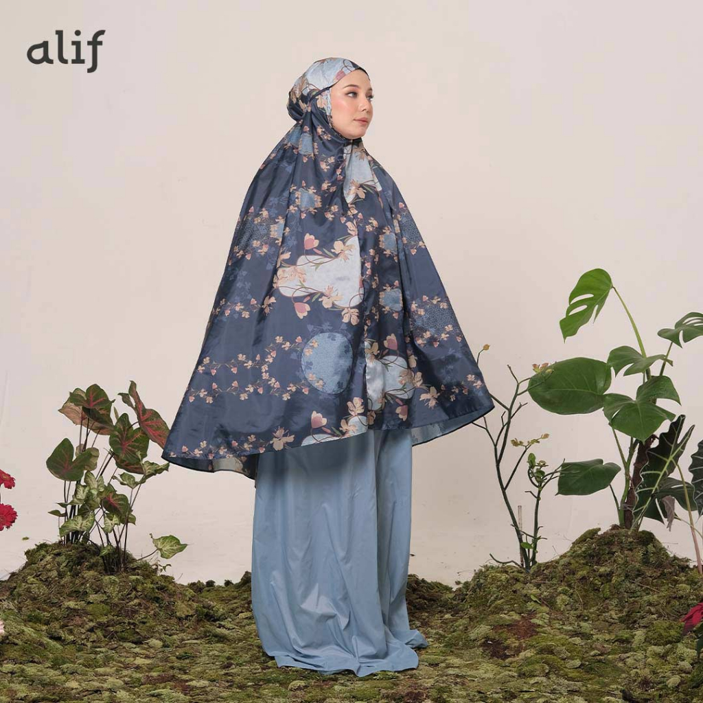 ALIF MUKENA MINI MOTIF PARASUT PREMIUM KOREA TRAVEL - PANSY IN PLACID BLUE ( MKN-217 )