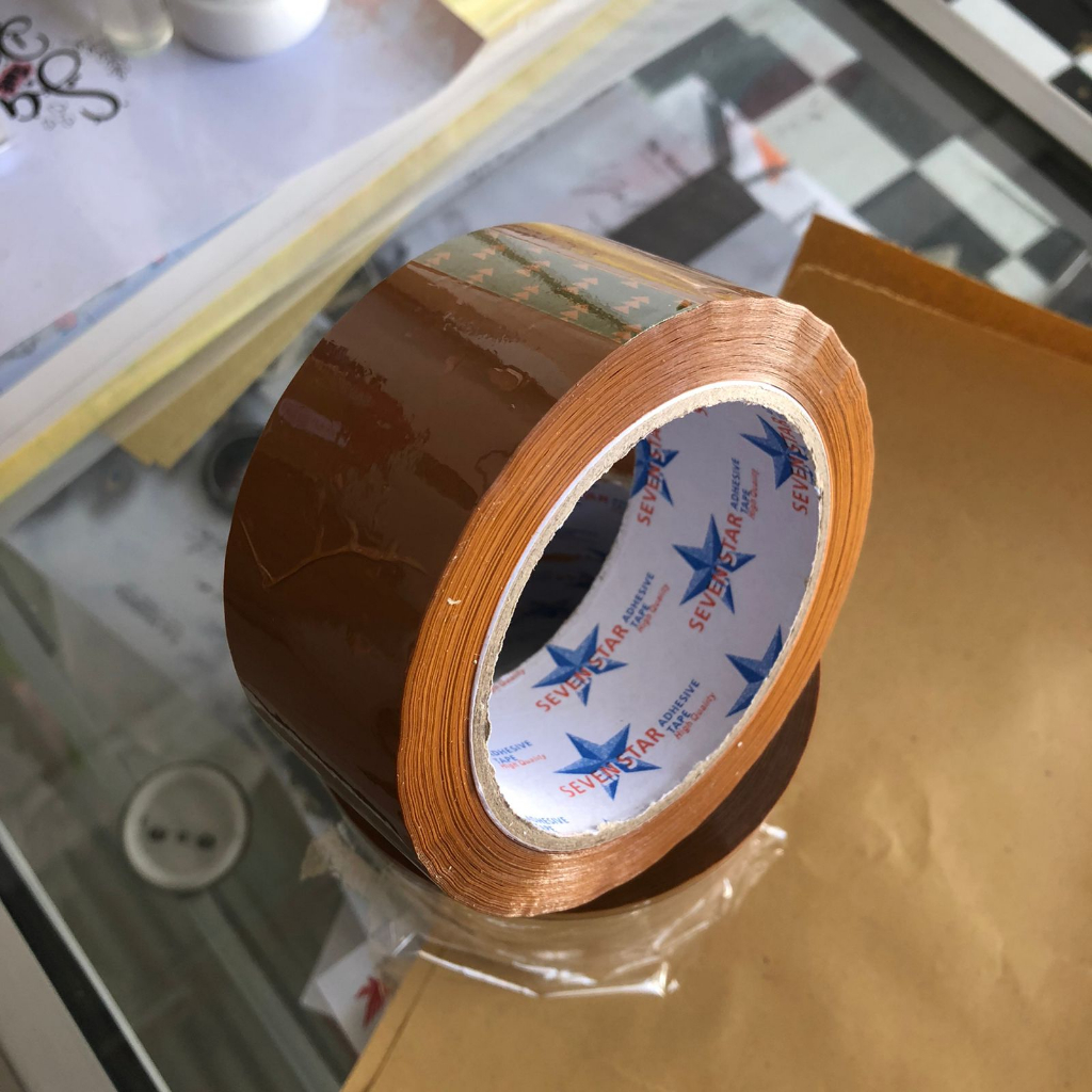 

Lakban Isolasi 2 Inch 48mm SEVEN STAR Bening Coklat 100 Yard ASLI