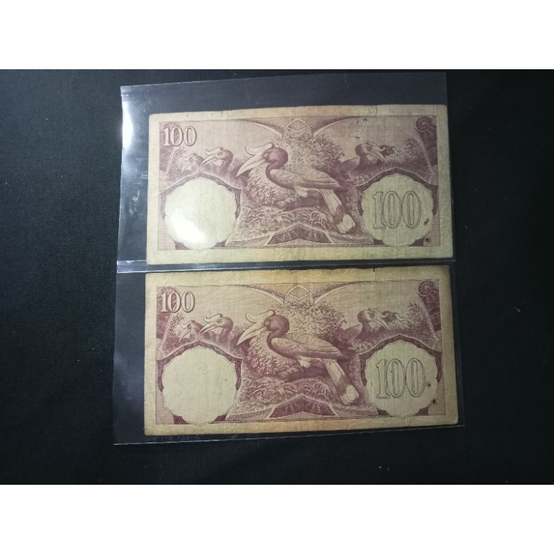 2 lembar 100 rupiah seri bunga vf