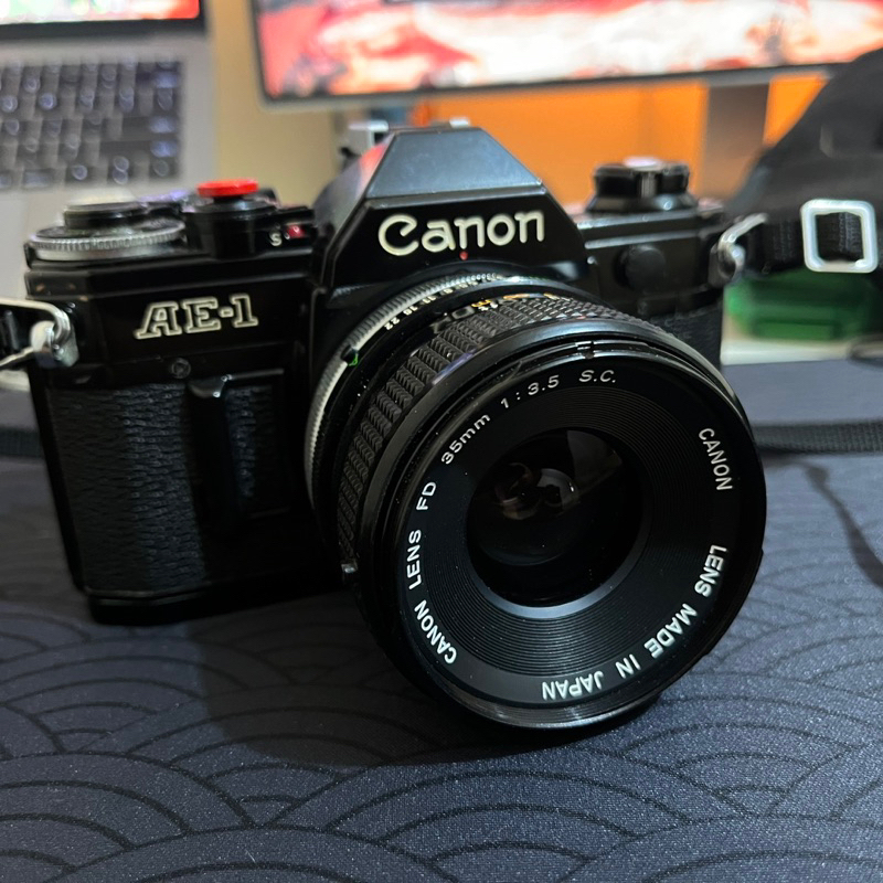 Canon AE-1 with Canon FD Lens F 3.5 35mm + Flash + ND Filter