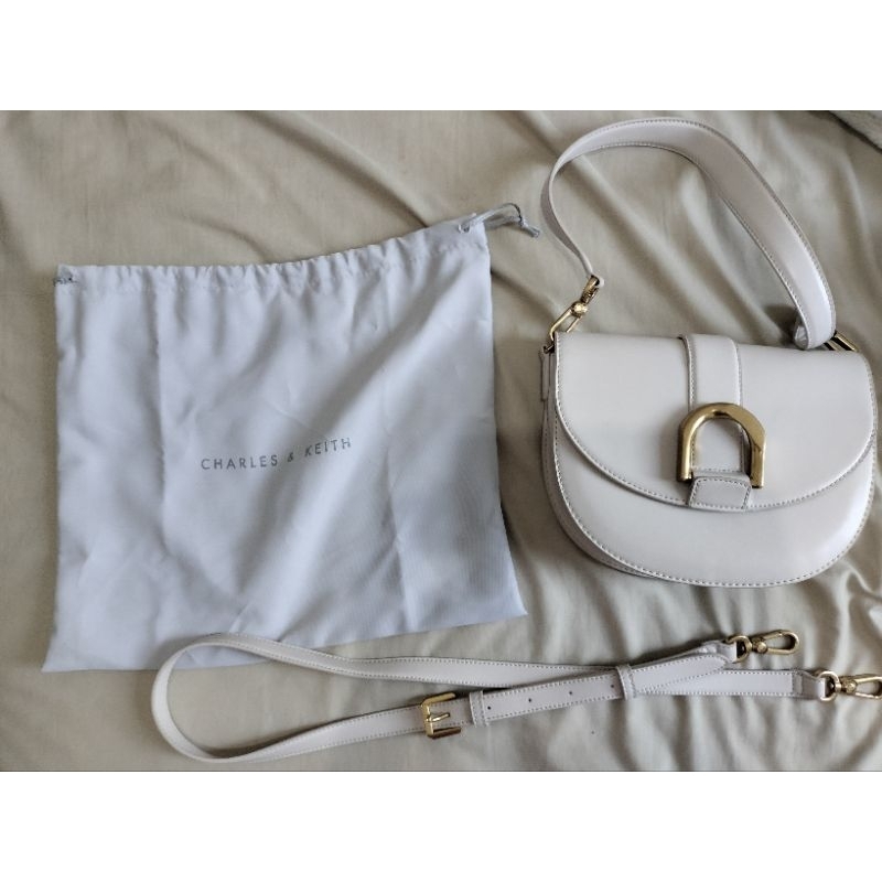 Tas charles and keith gabin saddle bag
