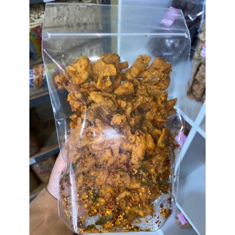 

Kripik kulit ayam pedas kemasan repack 250g