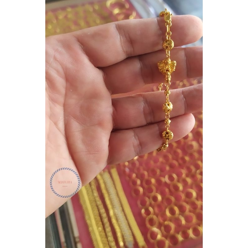 Gelang oval variasi kupu " emas kadar 375