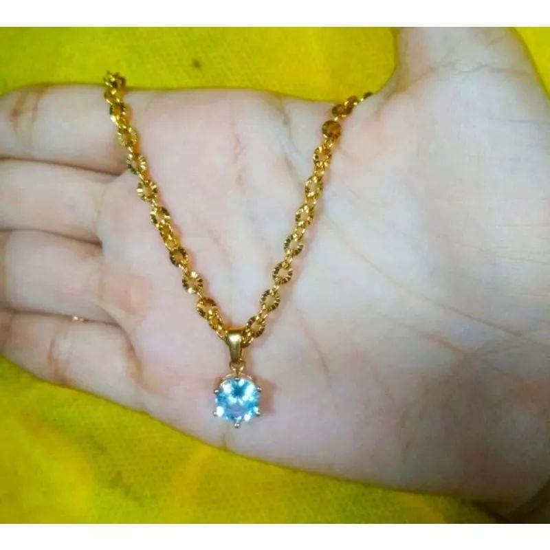 Kalung titanium liontin mata satu