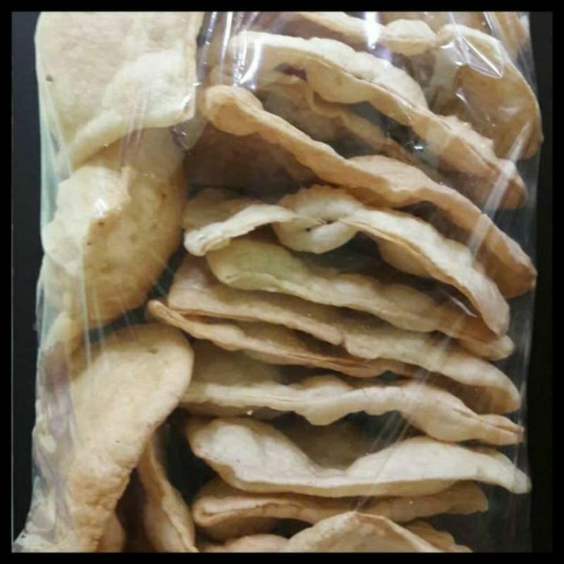 

KERUPUK LEPIT COKLAT PERBUNGKUS ISI 10PCS SIAP MAKAN