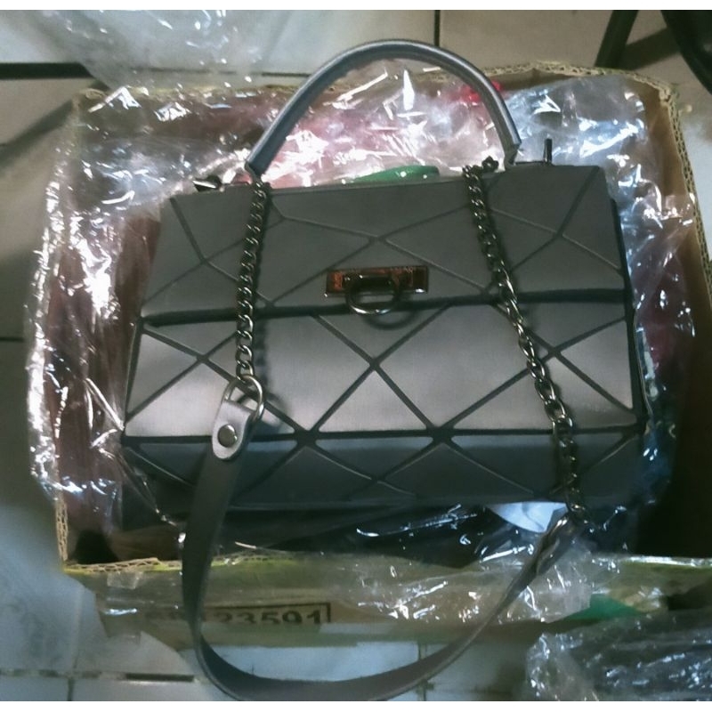 tas wanita yongki Komaladi