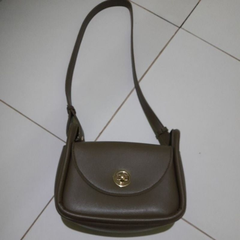 Preloved tas miniso free logam mulia/emas 0,001