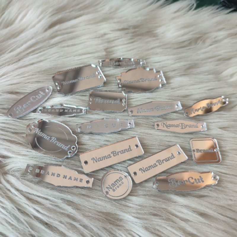 

Label Akrilik perak/silver mirror | Label Hijab Branding | Custom Cutting Label dan Grafir - VJCUT