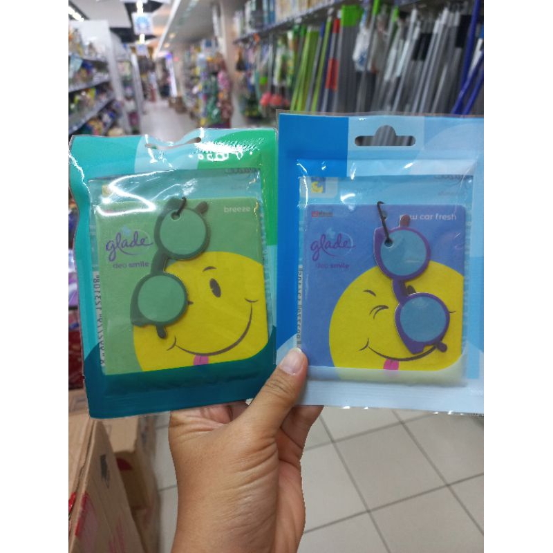 Glade deo smile . new car fresh dan breeze