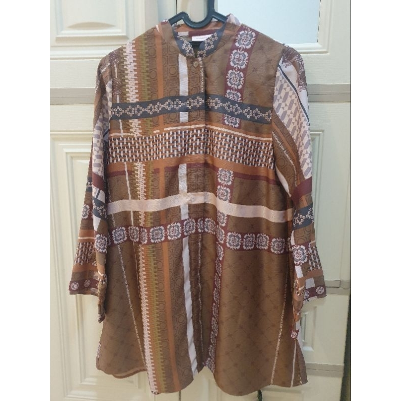 Atasan kemeja muslim, Ria Miranda