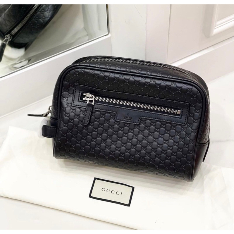 Gucci pochette in black leather GG