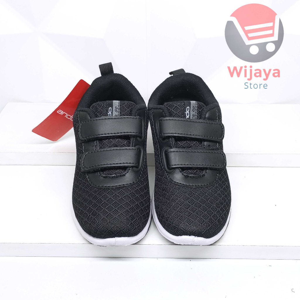 Sepatu Sekolah Ando 29-32 Sneaker Anak Hitam Putih Desain Strap Velcro Model SAGA BSC Nitta