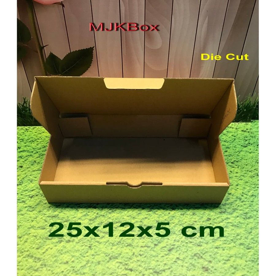 

Kotak Kardus karton Uk. 25x12x5 cm......Die Cut