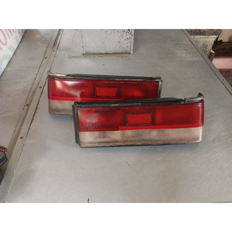 stoplamp lampu belakang mazda 323 trendy asli cabutan sepasang kiri kanan