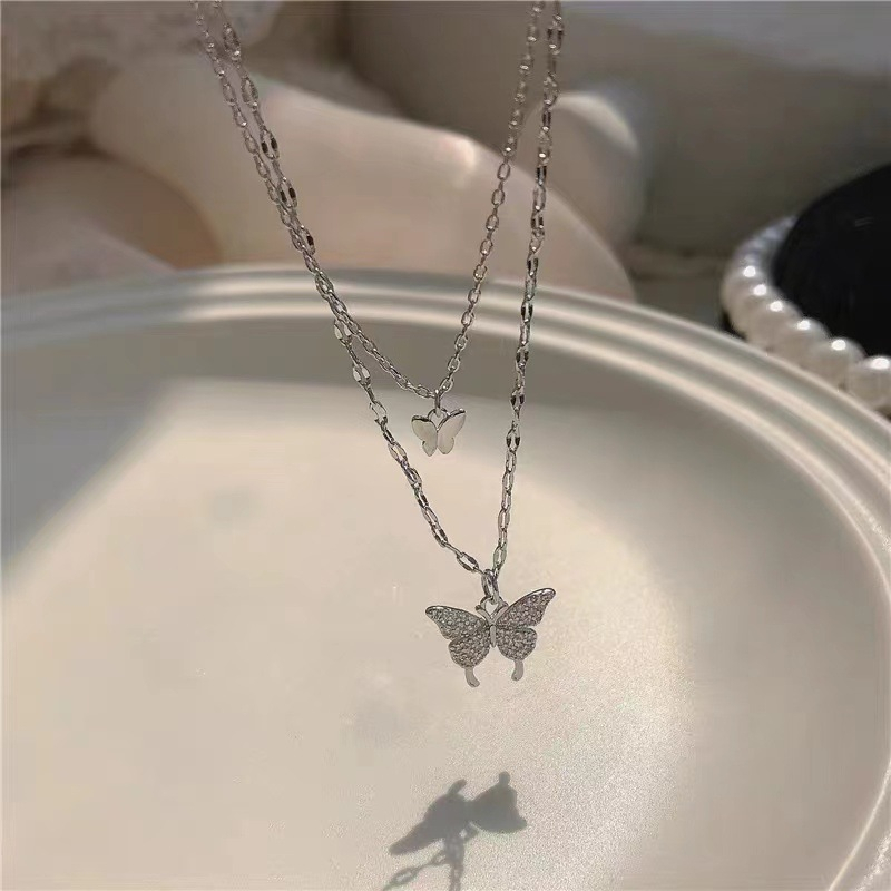 Kalung Fashion Wanita Liontin Kupu Kupu Ganda Layer Korea Rantai Klavikula Double Butterfly Necklace Multilayer Warna Silver NL 23