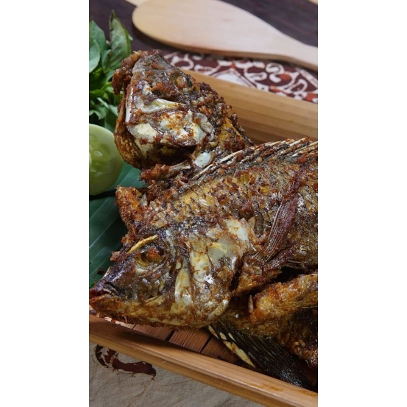 

IKAN NILA BUMBU UNGKEP ISI 2 IKAN TINGGAL GORENG UKURAN SEDANG