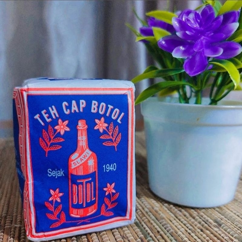

teh cap botol biru