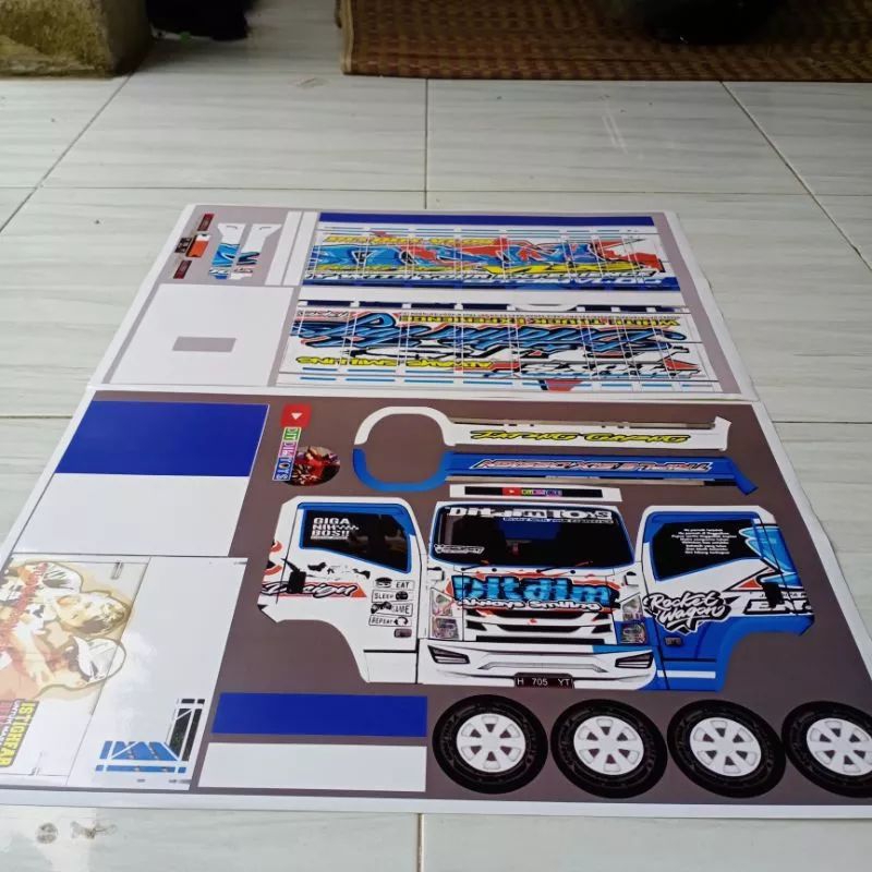lembaran pola atiker miniatur truk oleng JNE