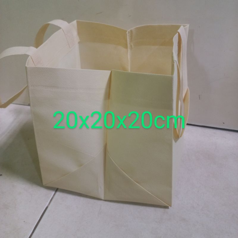 

tas spondbond polos,tas box kue 20x20cm 75gsm