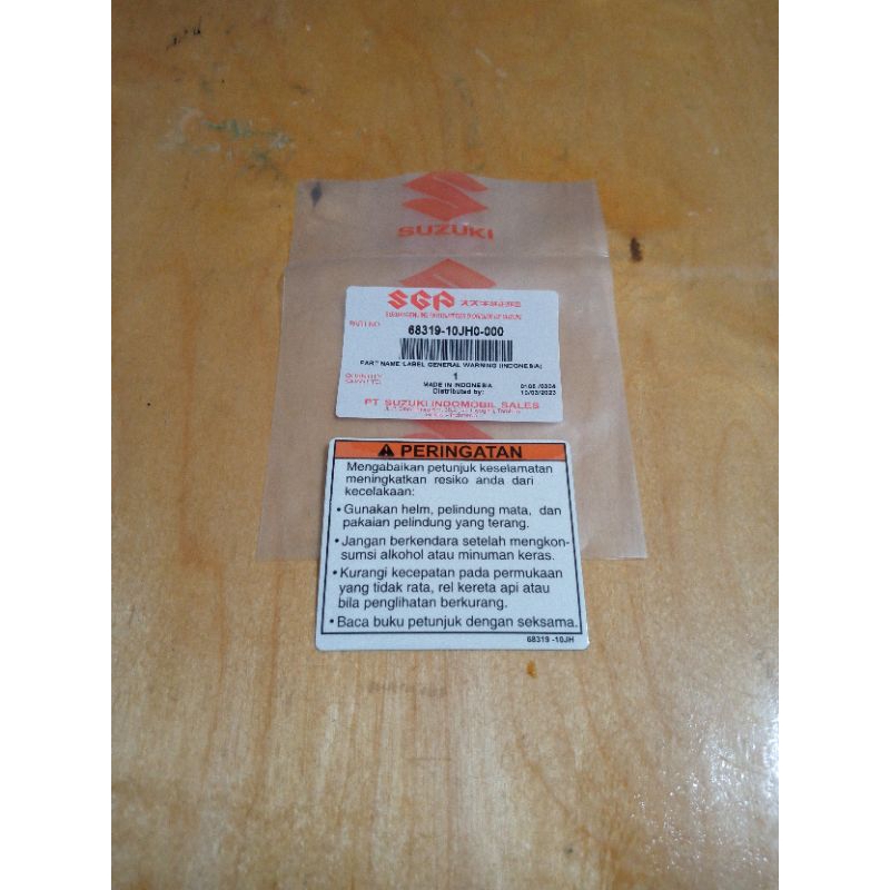 stiker warning label perhatian dek tengah semua type motor suzuki original sgp