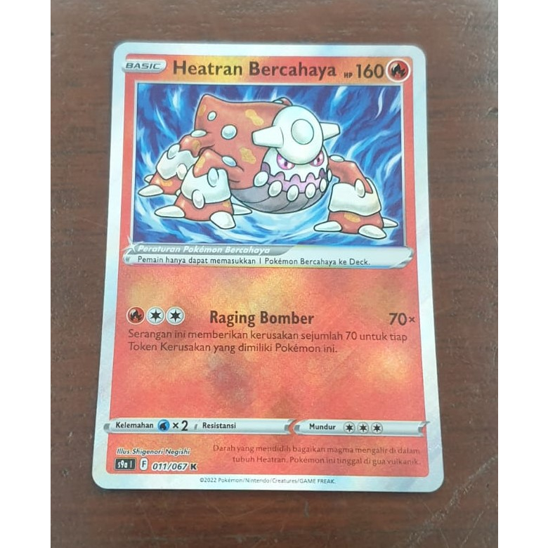 Heatran bercahaya pokemon TCG 011/067