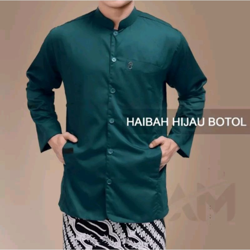 BAJU MUSLIM PRIA KOKO HAIBAH SEMI JAS TROMPAH POLOS LENGAN PANJANG.