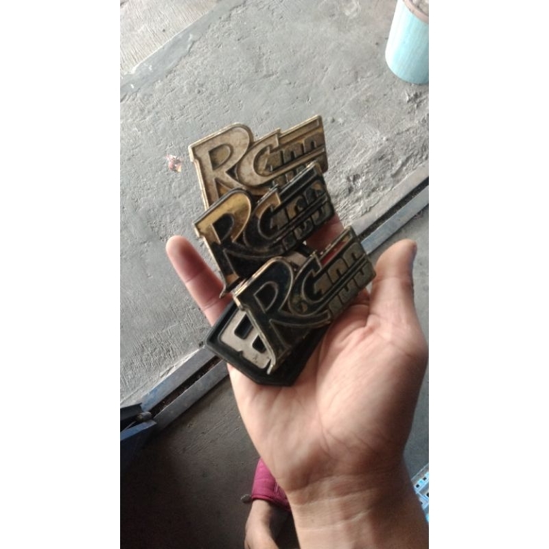 emblem sayap Rc 100