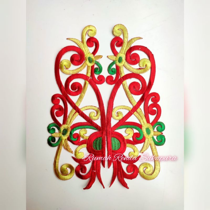 renda bordir motif tempel dayak