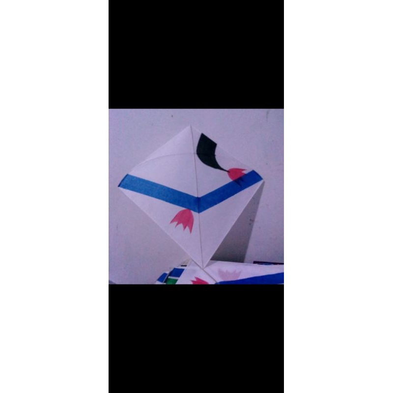 layangan aduan kertas minyak