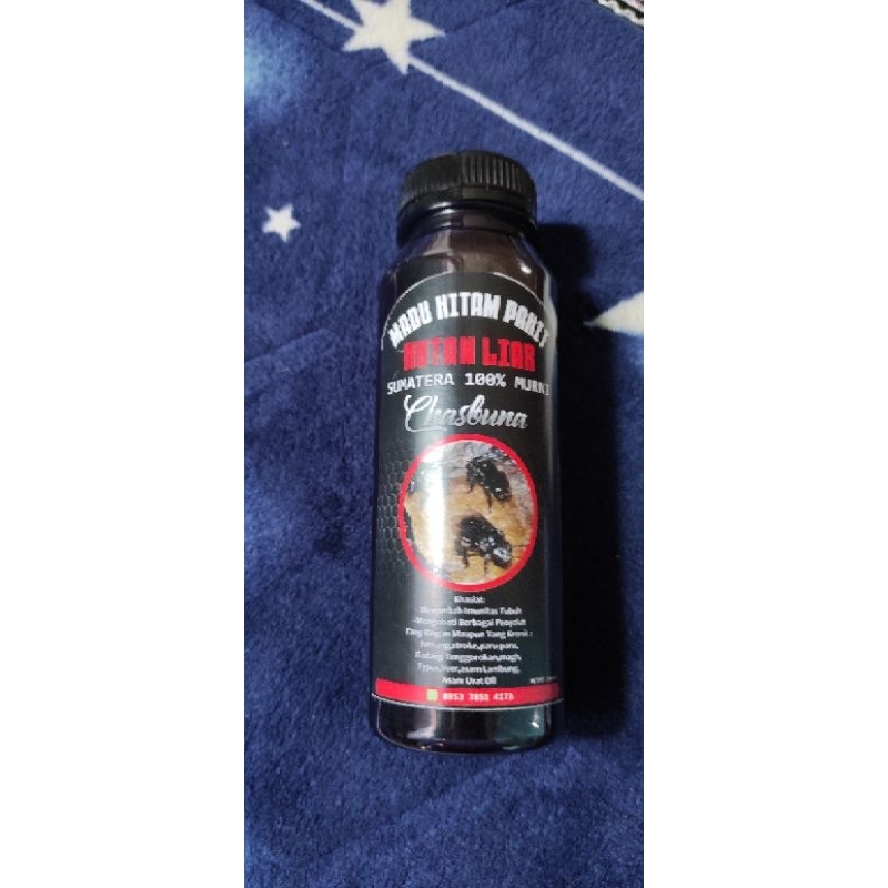 

madu hitam hutan liar 250ml