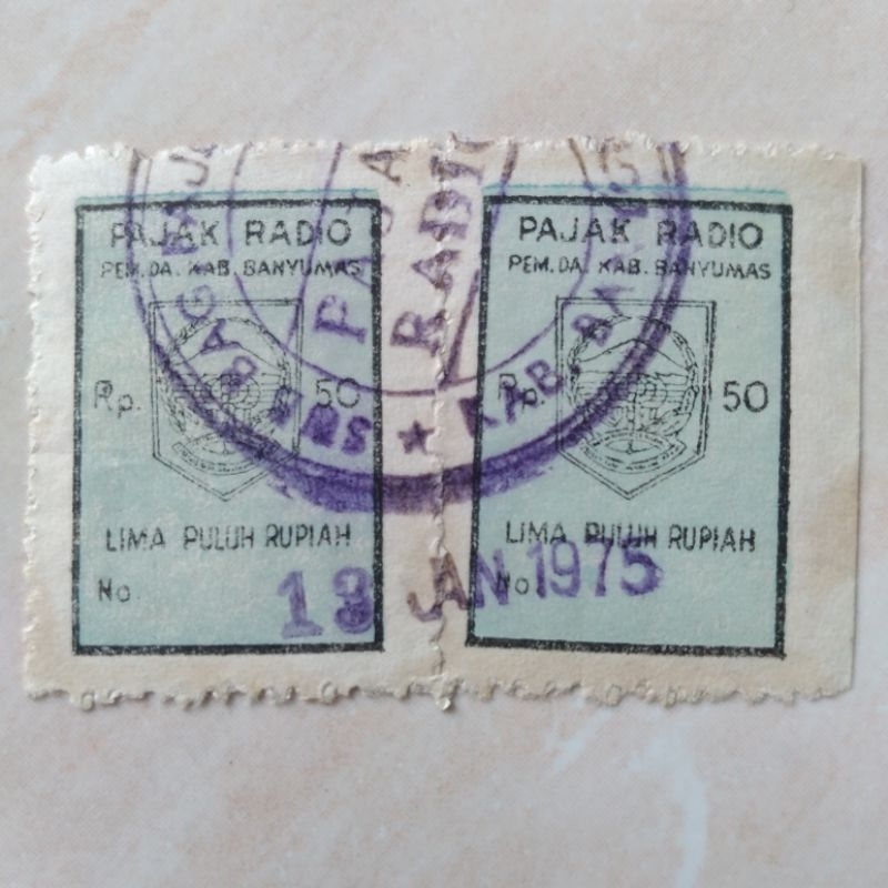 

Koleksi Bea Pajak Radio Rp 50 Banyumas Blok 2 Used 1975 - YN443