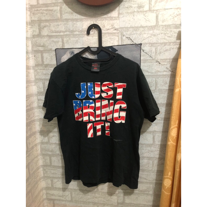 The rock T-shirt Just Bring it Copyright 2002