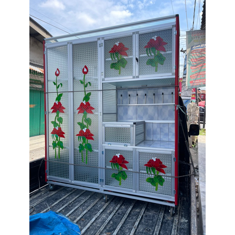 Lemari Rak Piring 4 Pintu Keramik Roda Kaca Painting