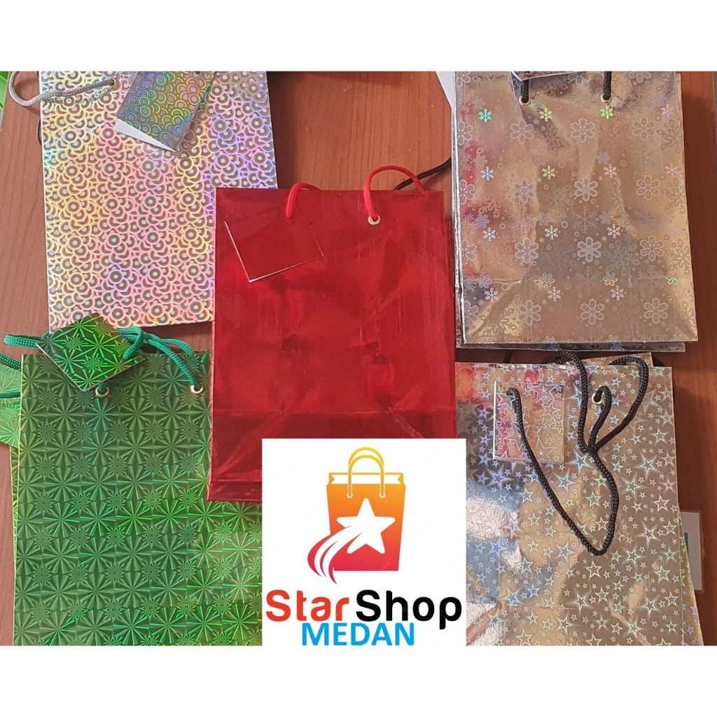 

PAPERBAG HOLOGRAM GLOSSY/KILAT MEREK KIKY size M , CORAK CAMPUR