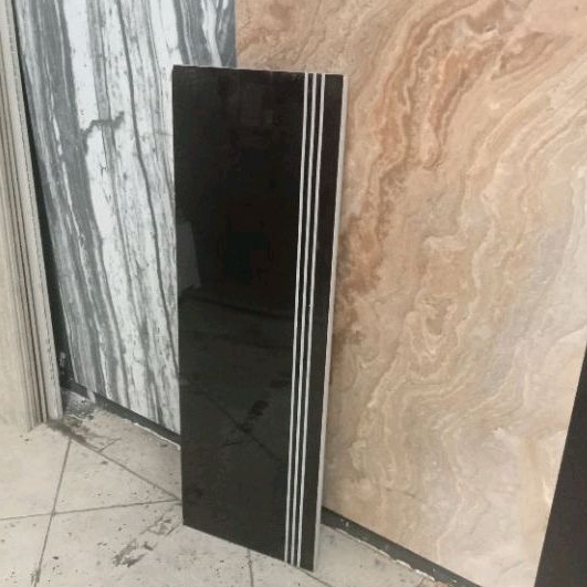 granit tangga hitam polos 30x100