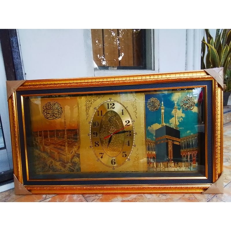 Jam dinding  motif mekah madinah