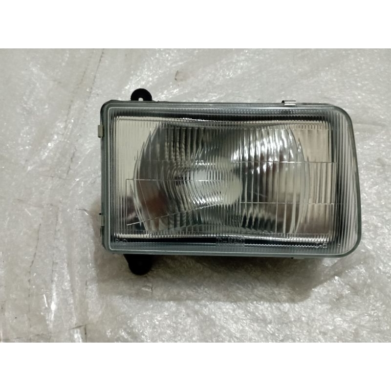 lampu depan isuzu panther