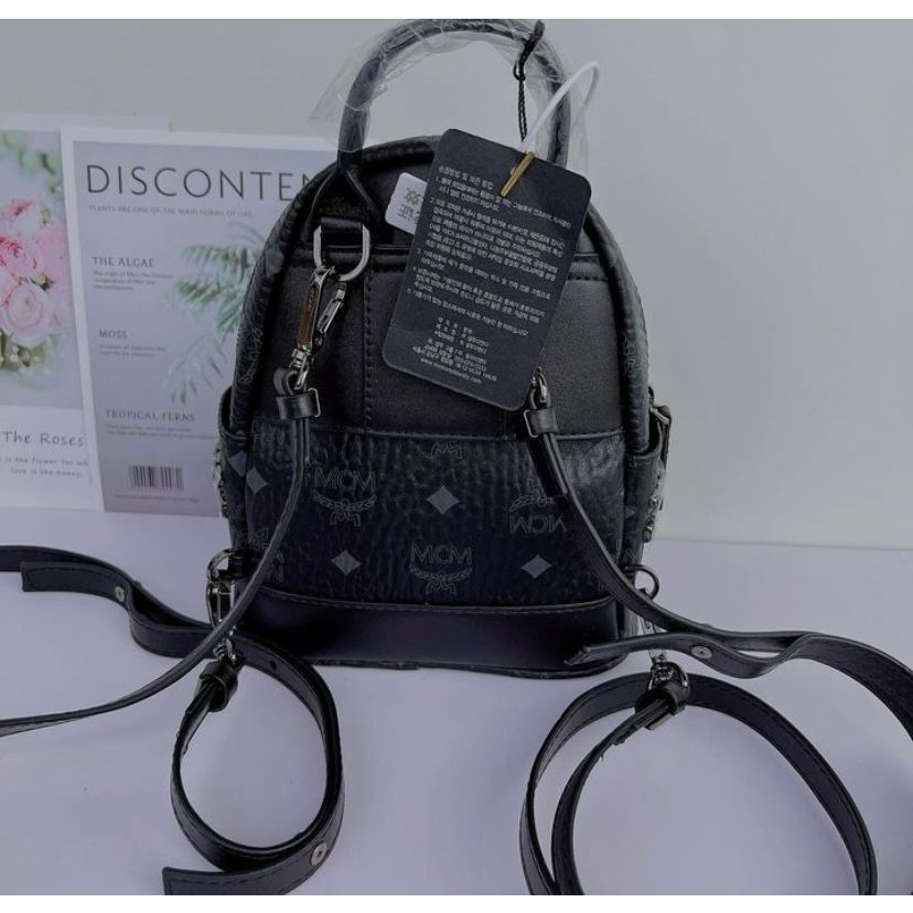 MCM STARK SIDE STUDS BEBE BOO BACKPACK IN VISETOS COGNAC HITAM