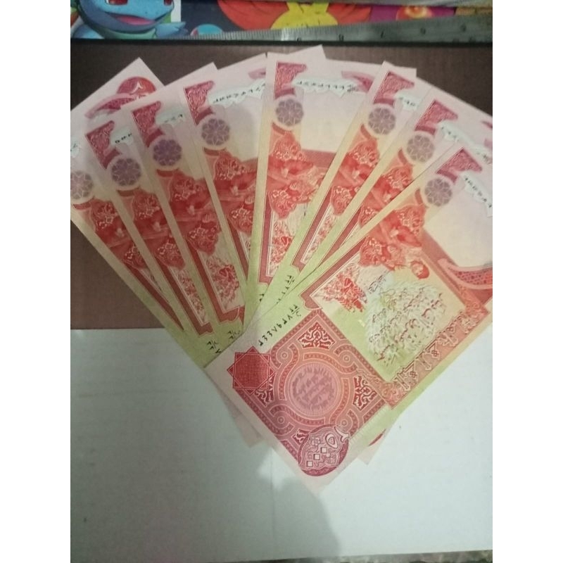 uang dinar Irak 25000 asli