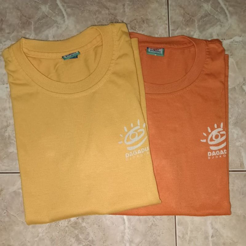 PRELOVED DAGADU DJOGDJA Kaos Wisata Oblong Lengan Pendek