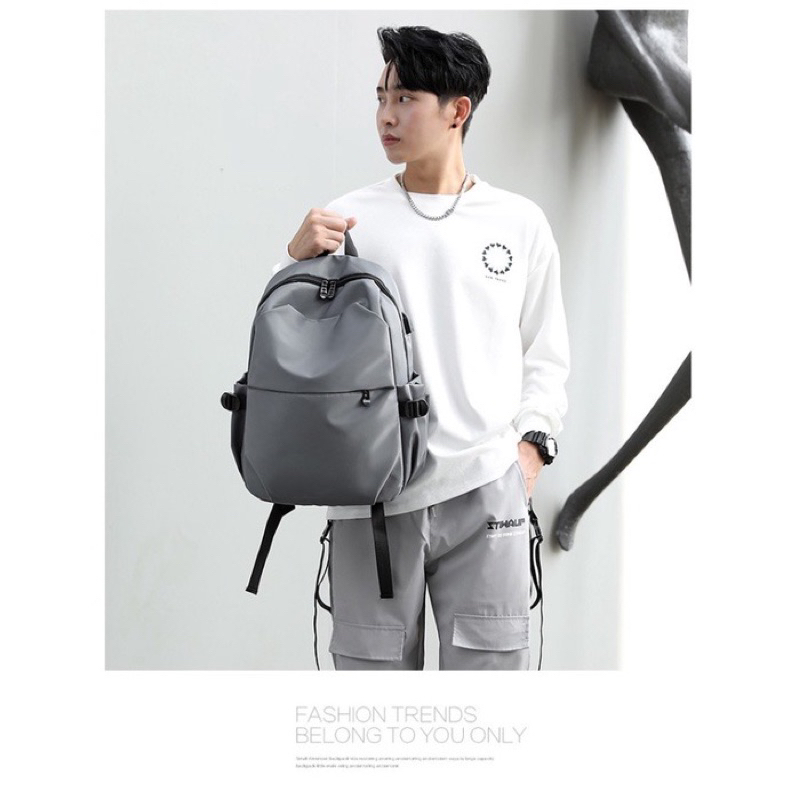 Tas Ransel Laptop sampai 15.6 inch Premium Anti Air Dengan Slot Usb untuk cas Hp Model Korea